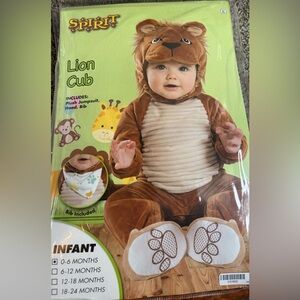 Spirit Halloween Lion Cub costume 0-6 months. Includes plush jumpsuit, hood, bib